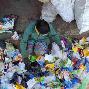 Waste picker sorting dry waste